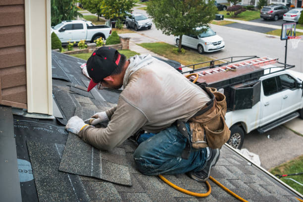 Professional Roofing technician working in Rochert, MN